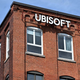 A photo of the outside of Ubisoft Montreal's large office building.